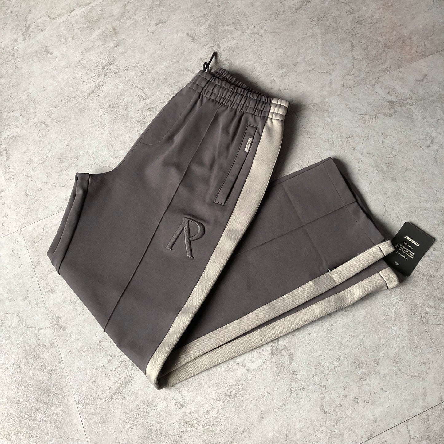 REPRESENT INITIAL TRACK PANTS🔥